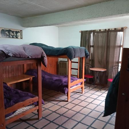 Hostel La Casa De Tounens ปูแอร์โตมาดริน ห้อง รูปภาพ